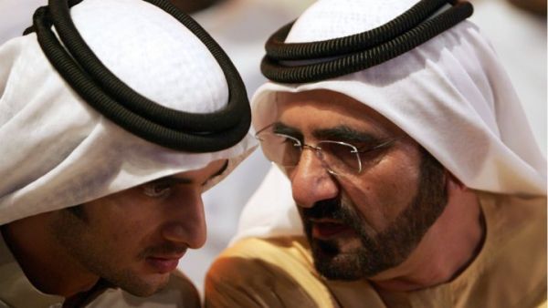 Sheikh Mohammad bin Rashid al Maktoum (right), ruler of Dubai and prime minister of the UAE, and his son Rashid, who died on September 19, 2015. (AFP/Karim Sahib)