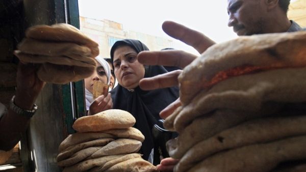 A woman stands in line for subsidised bread. (AFP/File)