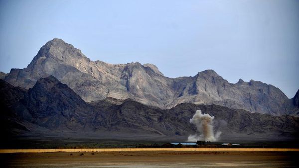 An explosion is set off in the distance in Farah province. (AFP/File)