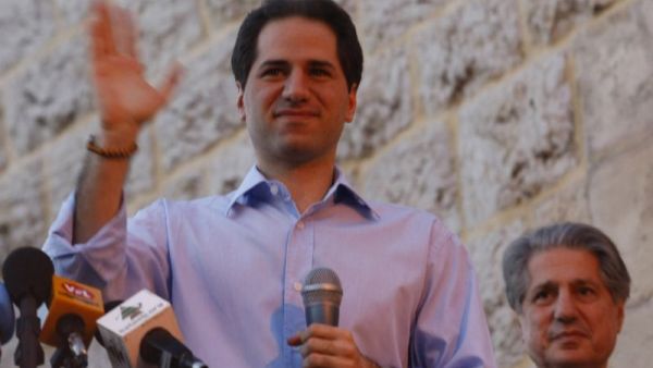 Lebanese Maronite Christian MP Sami Gemayel waves to the crowd. (AFP/File)
