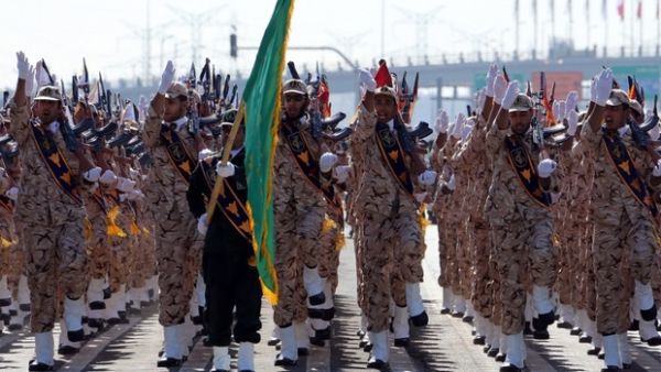 Iranian soldiers from the Revolutionary Guards march during a military parade last month in Tehran. (AFP/File)