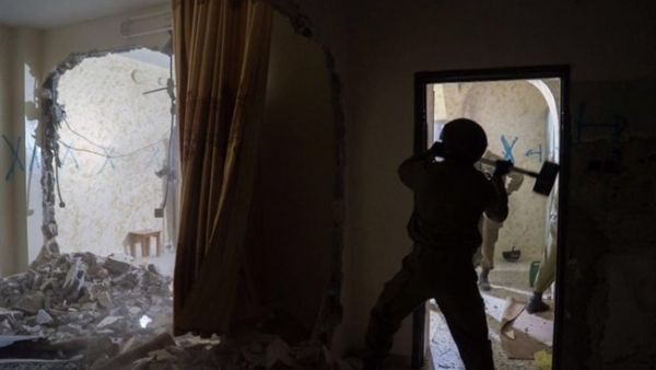 Israeli forces demolish the home of Ihab Maswada on March 31, 2016. (Israeli army/File)