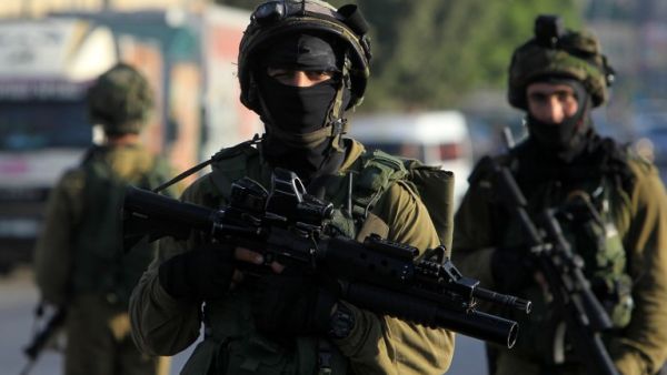 Israeli soldiers patrol a street, east of the West Bank city of Nablus. (AFP/File)