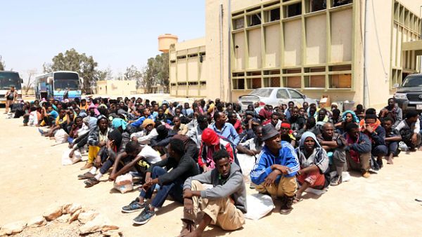 Migrants from sub-Saharan Africa sit at a centre for illegal migrants in Misrata, Libya. (AFP/Mahmud Turkia)