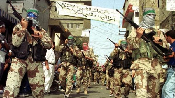 Gunmen march through Sidon's Ain al-Helweh camp. (AFP/Mahmoud Zayat)