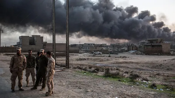 Iraqi oil fields on fire outside of Mosul. (AFP/File)
