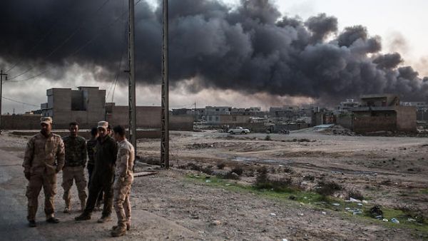 Iraqi oil fields on fire outside of Mosul. (AFP/File)