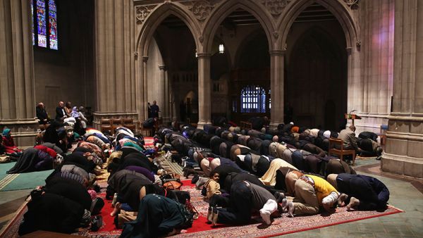 Muslims participate in a Friday prayer November 14, 2014 at the National Cathedral in Washington. (AFP/File)