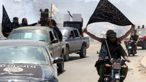 Fighters from Al-Qaeda's Syrian affiliate Al-Nusra Front patrol the northern city of Aleppo in May 2015. (AFP/Fadi al-Halabi)