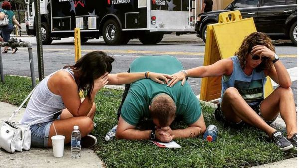 People mourn their lost loved ones outside the Pulse nightclub where the attack took place. (AFP/File)