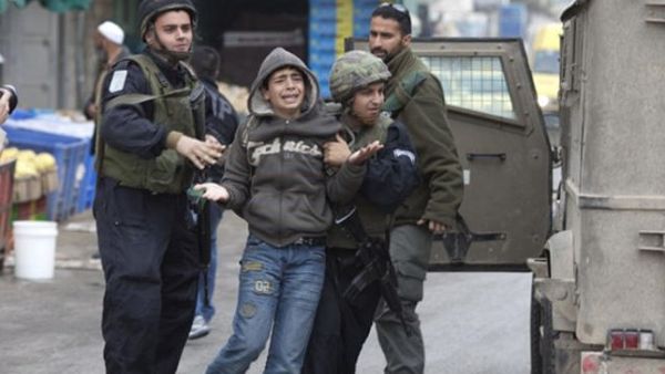 B'Tselem: Israel's use of administrative detention on Palestinian minors steadily increasing. (AFP/File)