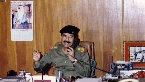 This handout dated 1991 shows toppled leader Saddam Hussein. Doesn't look like much of an Iphone he's got there. (AFP/File)