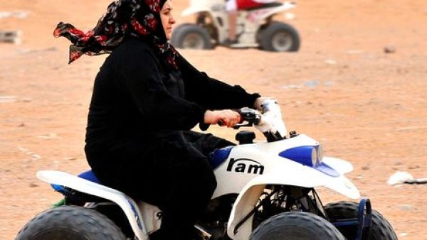 The picture of happiness: A Saudi woman drives an ATV (all-terrain vehicle). (AFP/File)