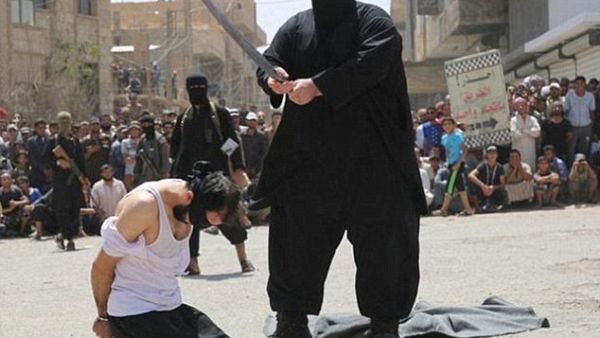 Obese executioner: The 30-stone militant has become infamous as one of Daesh's most feared executioners. (Courtesy photo)
