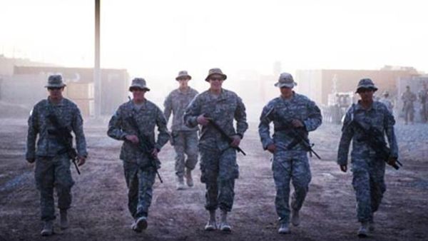 About 9,800 US troops are in Afghanistan. But the top US commander in Afghanistan, Army Gen. John F. Campbell, has given the administration several options to reduce this number over the next 15 months. (AFP/File)