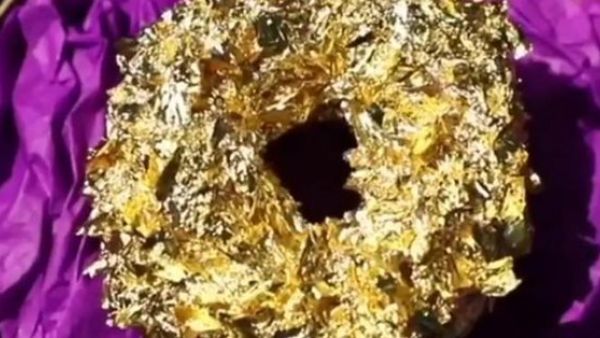 $100 doughnut containing 24-karat gold and Cristal champagne (Twitter)