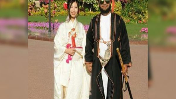 The two royals are seen in traditional dress at their wedding ceremony. (File photo)