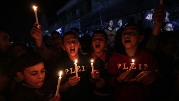 Palestinian youths at a demonstration against the Palestinian President in Rafah, Gaza, April 14 2017 (AFP/Said Khatib)
