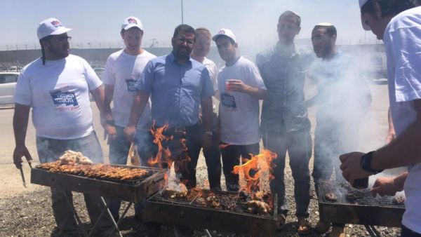Israelis barbecuing outside Ofer prison in the occupied West Bank. (Joe Dyke/Twitter) 