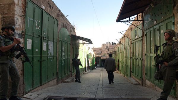 Closed shops on Shuhada street in Hebron, where the activists had been headed (Wikimedia Commons)