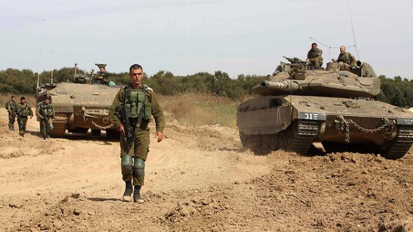 IDF forces operating along the Gaza border (AFP)