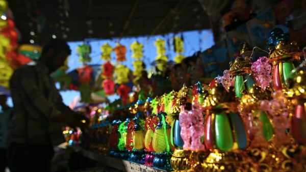 A Palestinian vendor sells lanterns at a market in Gaza City, as the faithful prepare for the start of the Muslim holy fasting month of Ramadan, on May 26, 2017. (AFP/Mohammed Abed)