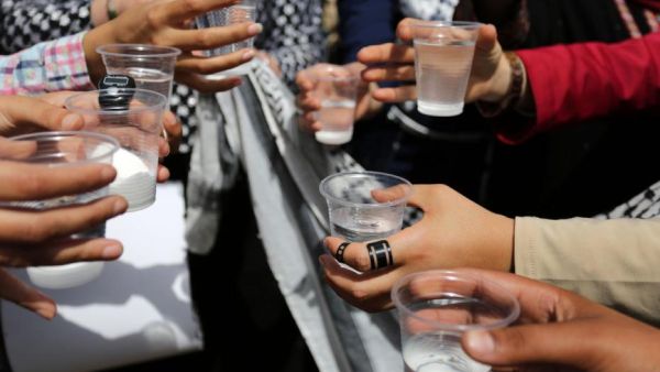 Thousands have joined the online campaign to drink a glass of salted water in a show of support with prisoners on hunger strike in Israeli jails. (Twitter)