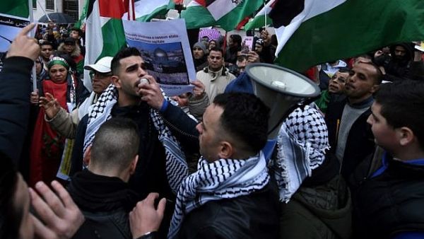 Demonstrators shout slogans and wave Palestinian flags during a demonstration in front of the US Embassy in Rome, December 9, 2017, against US President Donald Trump's recognition of Jerusalem as Israel's capital. (AFP/ File Photo)