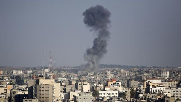 Smoke billows following an Israeli airstrike on Gaza City on August 19, 2014. (AFP/File)