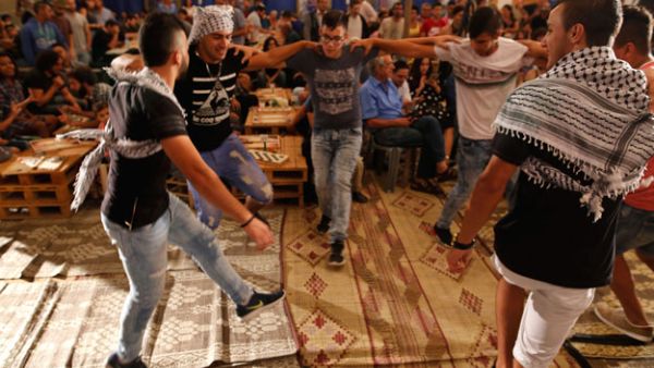 Palestinians perform a traditional Dabkeh. (AFP/ File Photo)