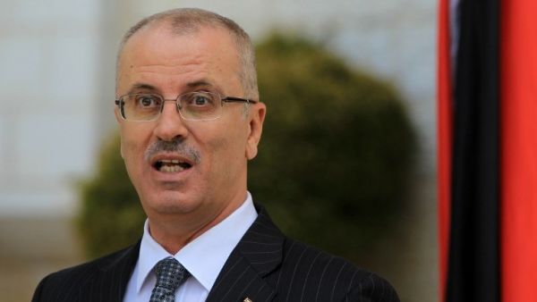 Palestinian Authority Prime Minister Hamdallah speaks during a press conference following the first cabinet meeting of the new Palestinian unity government in the West Bank city of Ramallah. (AFP/ File Photo)