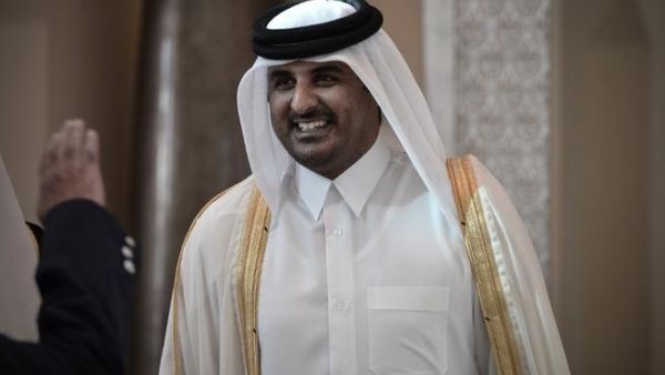 Former Qatari Crown Prince Sheikh Tamim bin Hamad al-Thani smiling as he arrives in the Bahraini capital of Manama, to attend the annual Gulf Cooperation Council (GCC) summit (Mohammed Al-Shaikh / AFP)