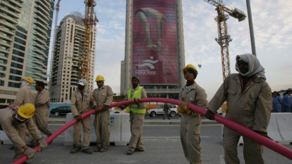 World Cup workers in Qatar are made to work for 12 hours at a time without a break.  They are not fed for entire days and denied access to drinking water. (Image credit: AFP)