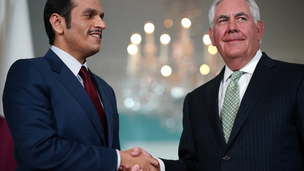 U.S. Secretary of State Rex Tillerson shakes hands with Qatari Foreign Minister Sheikh Mohammed Bin Abdulrahman Al Thani prior to a scheduled meeting at the State Department | AFP