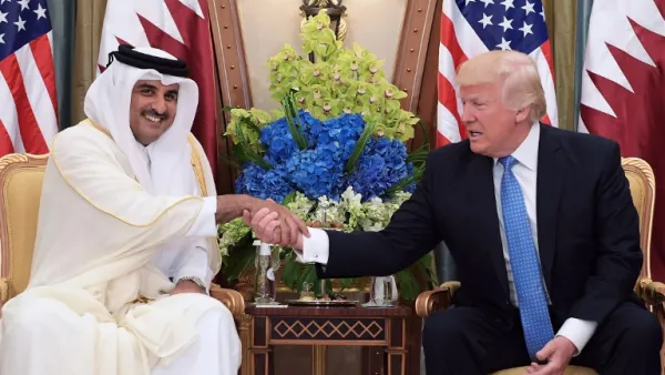 This file photo taken on May 21, 2017 shows US President Donald Trump (R) shaking hands with Qatar's Emir Sheikh Tamim Bin Hamad Al-Thani, during a bilateral meeting at a hotel in the Saudi capital Riyadh. (Mandel Ngan/AFP)