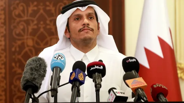 The Qatari foreign minister speaks at a press conference last month (AFP)