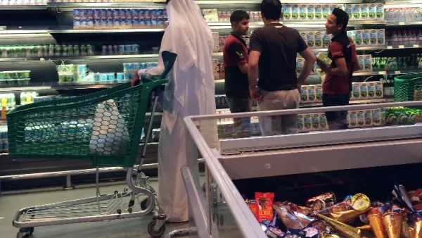 Customers are seen shopping at the al-Meera market in the Qatari capital Doha, on June 10, 2017.
 (Stringer/AFP)