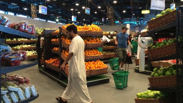 Customers are seen shopping at the al-Meera market in the Qatari capital Doha, on June 10, 2017. Saudi Arabia, Egypt, the UAE and Bahrain announced on June 5 they were cutting diplomatic ties and closing air, sea and land links with Qatar, giving Qataris within their borders two weeks to leave. (Stringer/AFP)