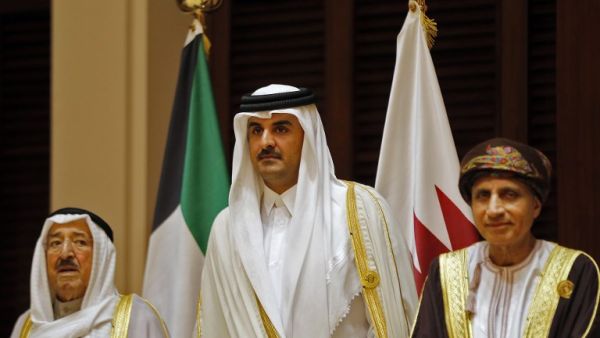 This file photo taken on December 07, 2016 shows Emir of Kuwait Sabah al-Ahmad al-Jaber al-Sabah (L), Emir of Qatar Sheikh Tamim bin Hamad al-Thani (C) and Oman's Foreign Minister Yusuf bin Alawi attending a Gulf Cooperation Council (GCC) summit in the Bahraini capital Manama. (AFP/Stringer)
