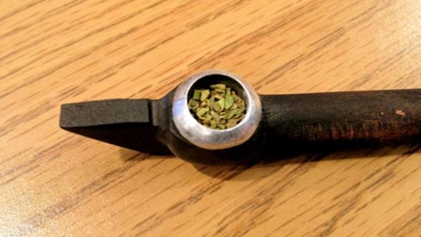  Smoking dokha. A “hit” functions in the same way a puff of a cigarette does, but the higher concentration of tobacco causes a brief sensation of lightheadedness, especially for first-timers. (AFP/File Photo)	