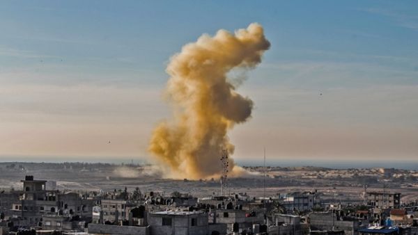 Smoke billows after an explosion on the Egyptian side of Rafah (AFP/File Photo)