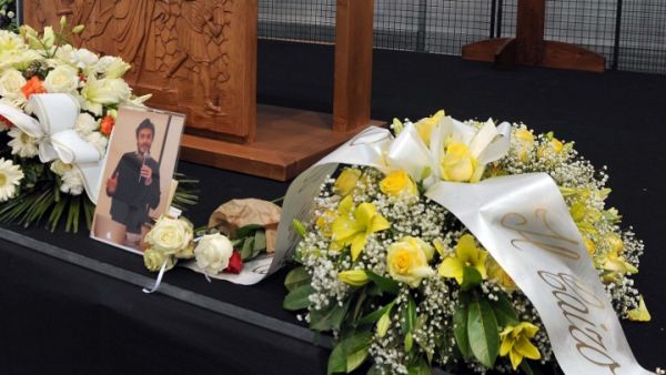 A memorial display at Giulio Regini's funeral in Italy. (AFP/Diego Petrussi)