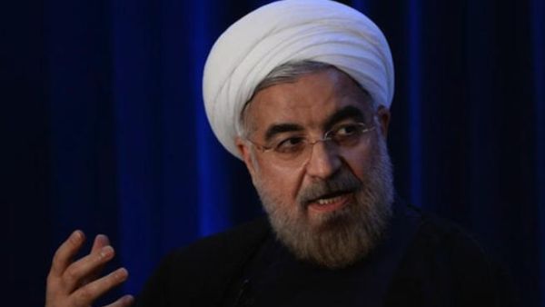 Back at home, Iranian President Hassan Rouhani is facing pressure from hard-liners not to release too much to reach a deal, and to deliver on a promise to lift sanctions. (AFP/File)
