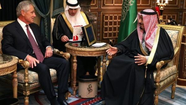 U.S. Secretary of Defense Chuck Hagel meets with Saudi Crown Prince Salman bin Abdulaziz while Ambassador Adel Al-Jabeir listens, on December 9, 2013 in Riyadh. [AFP]