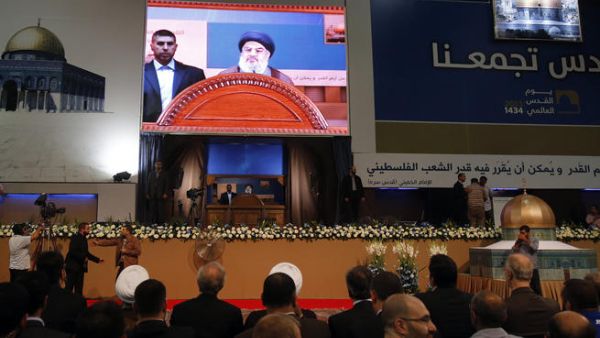 A general view shows Hezbollah's chief Hassan Nasrallah delivering a speech during a rare public appearance at a gathering to mark the "Al-Quds (Jerusalem) International Day" (AFP/ANWAR AMRO)