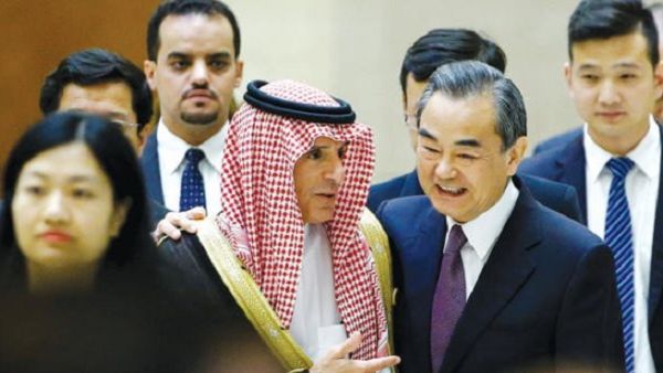 Saudi Foreign Minister Adel Al-Jubeir and Chinese Foreign Minister Wang Yi arrive for a news conference at the China-Arab States Cooperation Forum in Beijing on Tuesday. (AN)