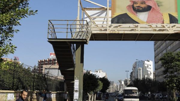 A poster of Saudi Crown Prince Mohammed bin Salman hangs on a pedestrian crossing bridge in the northern Lebanese port city of Tripoli (Joseph Eid/AFP) A poster of Saudi Crown Prince Mohammed bin Salman hangs on a pedestrian crossing bridge in the northern Lebanese port city of Tripoli (Joseph Eid/AFP)