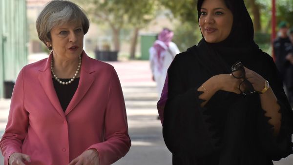 British Prime Minister Theresa May walks alongside Princess Reema Bint-Bandar al-Saud. (AFP) 