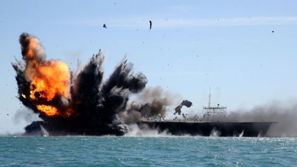 Iran's Revolutionary Guards attack a naval vessel during an exercise in the Strait of Hormuz on February 25, 2015 (AFP)