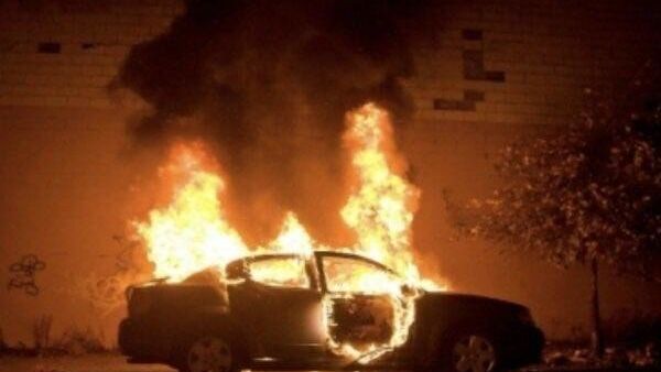 Police arrest two people linked to arson attack on Saudi woman’s car in Makkah, Monday. (Social Media)